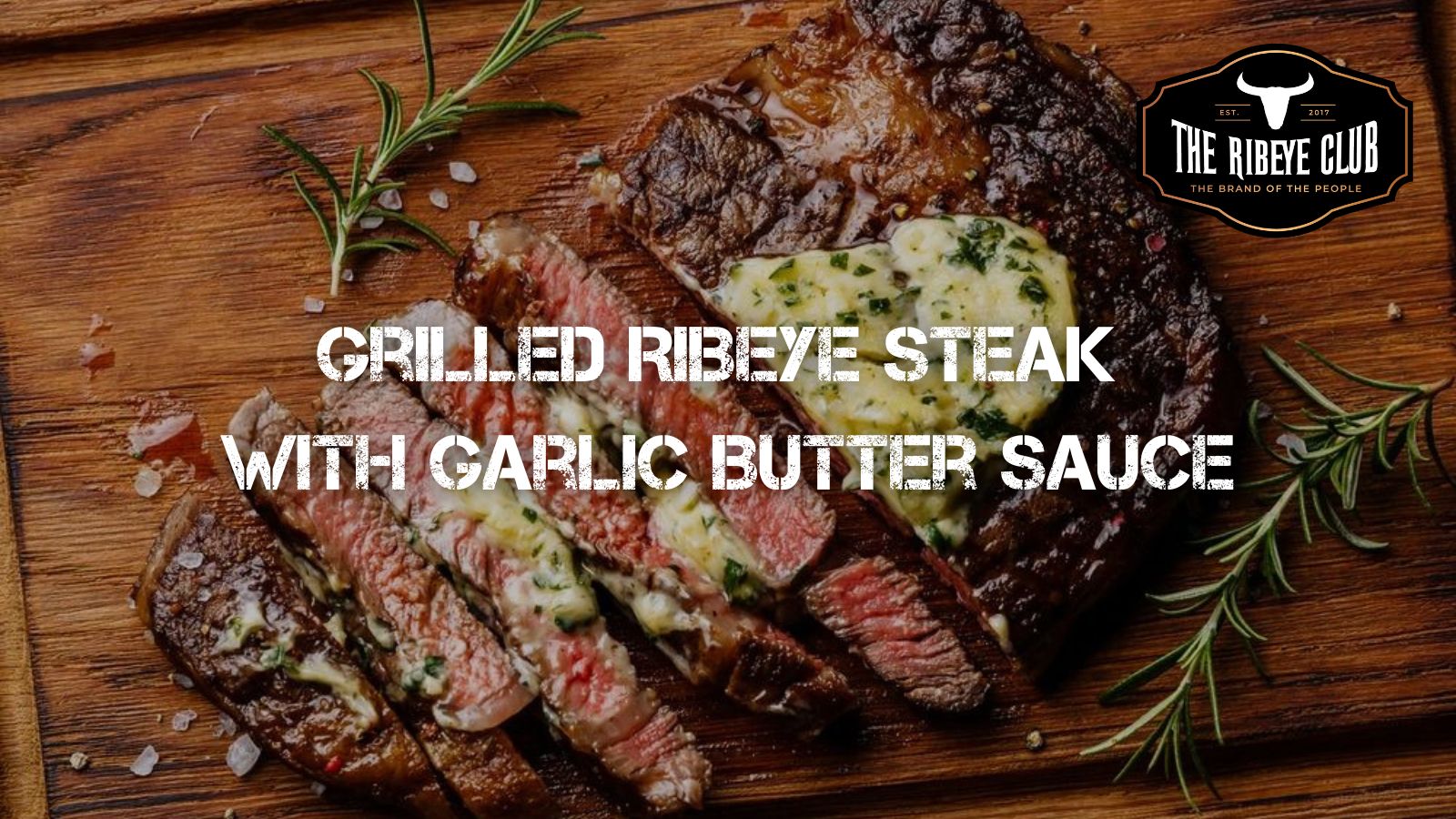 Grilled Ribeye Steak with Garlic Butter Sauce